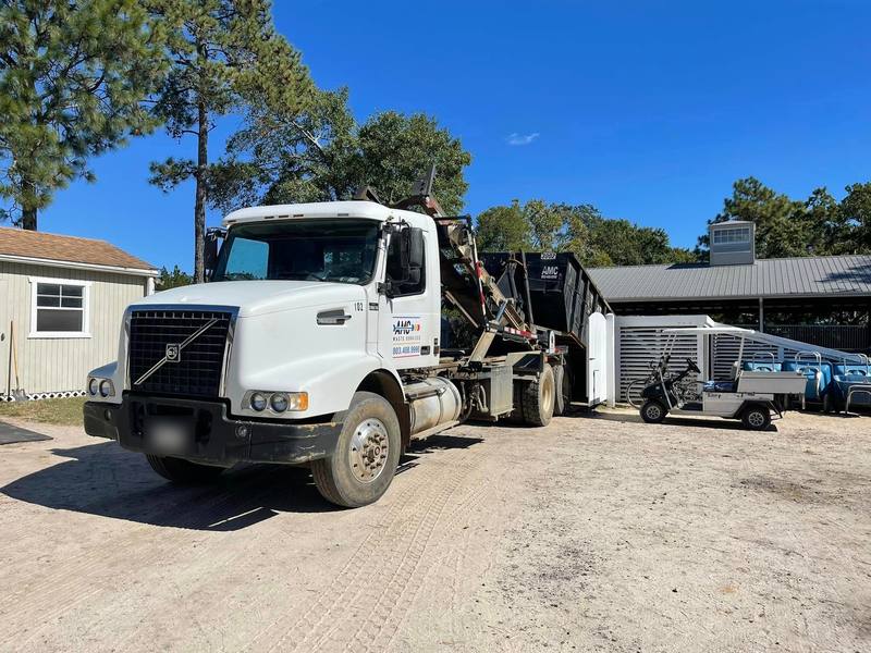 An AMC Waste Services roll-off truck at the yard in Lugoff, SC